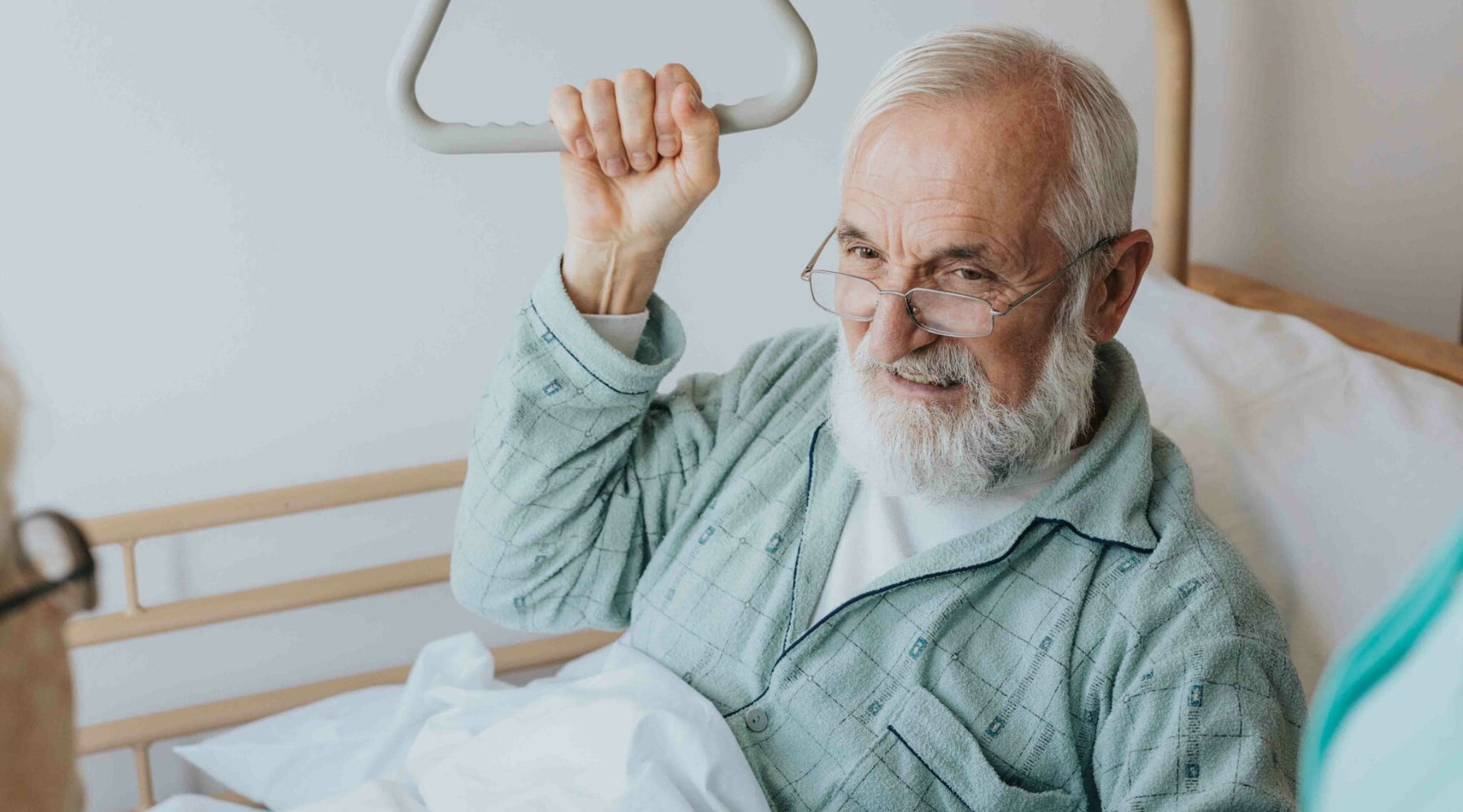 senior men in a hospital bed