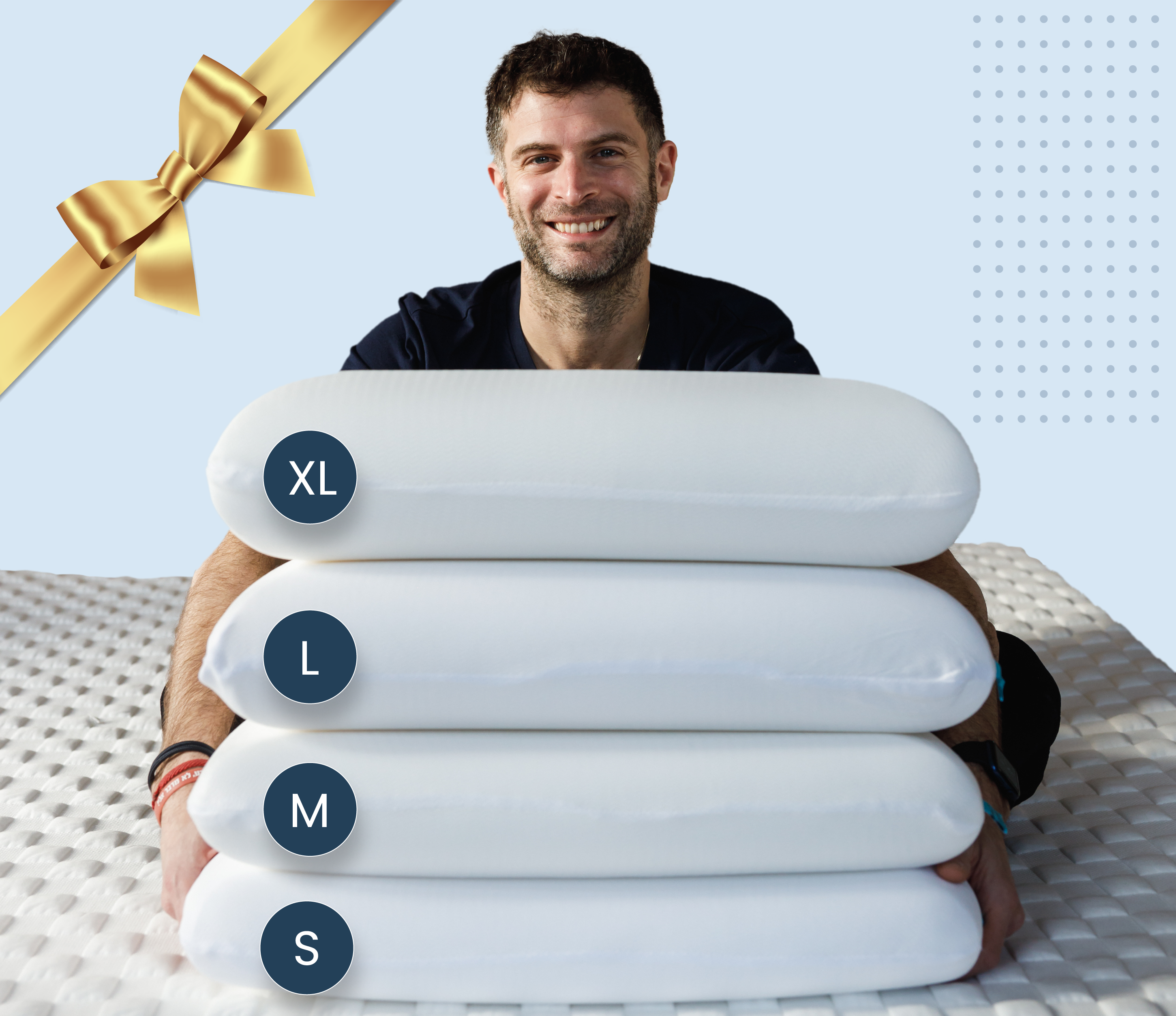 james leinhardt holding 4 levitex pillows in his arms