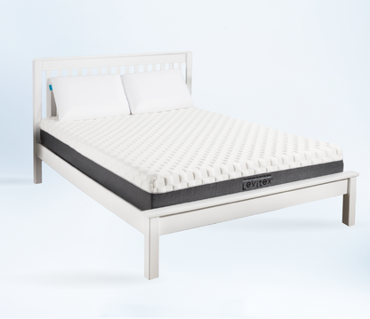 posture Mattress on a bed with Levitex branding on a white background