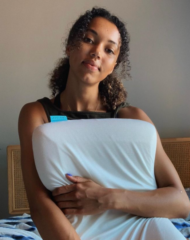 morgan lake holding a levitex pillow